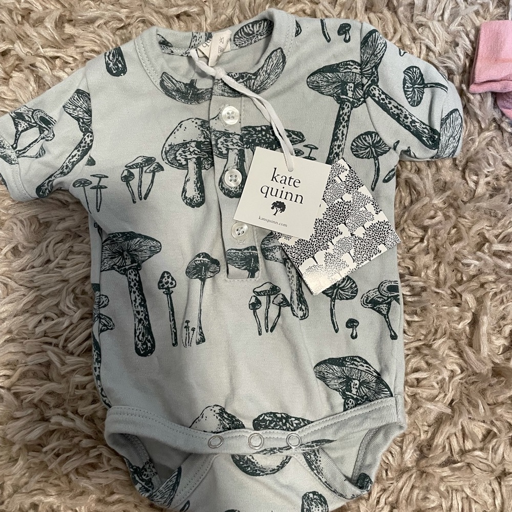 Kate Quinn onesie